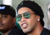 Ronaldinho i Ravenna: s 46 godina vraća se na teren, a nedostaje mu još jedan gol do 300 Ronaldinho s kapom i sunčanim naočalama kao gost na tribini